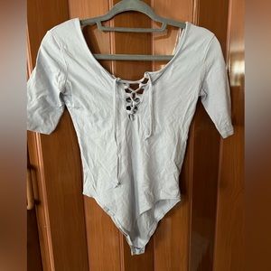 Atmosphere size 6 light purple bodysuit lace up front